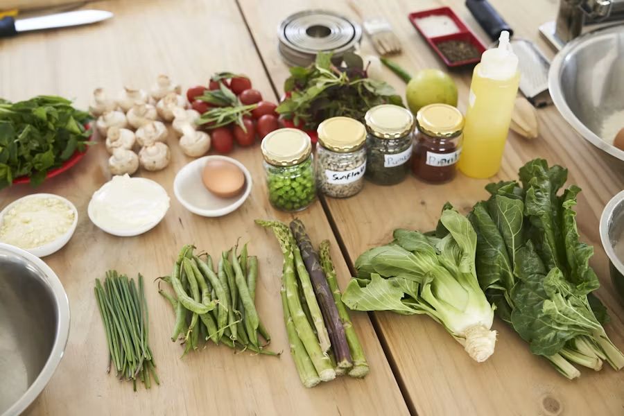 Ingredients laid out on a wooden prep table before cooking